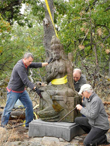 Volunteers install a Tara statue given to us by kind benefactor Peter Glavin
