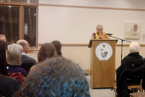 Geshe Thubten Phelgye reciting a brief prayer before starting his talk before about 40 people, at Seattle University.