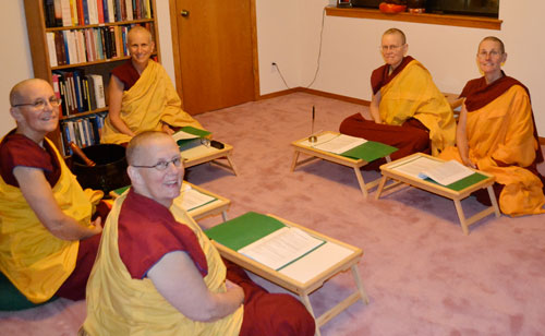 Sravasti Abbey bhikshuni sangha begin their first official posadha, or confession ceremony. Clockwise from top, beginning in the center, they are abbey founder Ven. Thubten Chodron, Ven. Thubten Tarpa, Ven. Thubten Chonyi, Ven. Thubten Jigme, and Ven. Thubten Semkye.