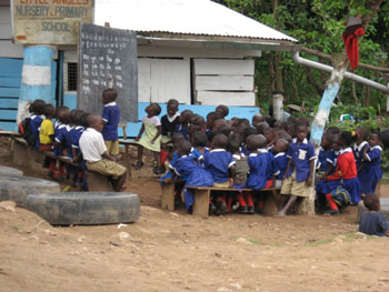 Students gather at an outdoor classroom at the Little Angels School.
