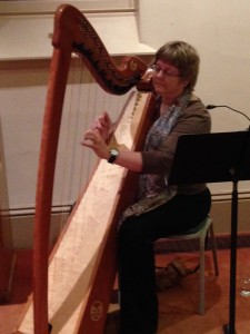Kim Swennes, a harpist, creates music that brings peace to people at the ends of their lives