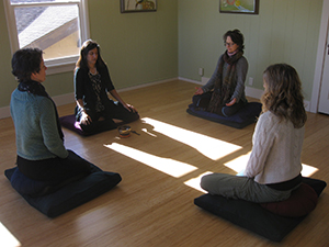 The therapist team meditates together. From left to right: Mary Roy, MSW; Neha Chawla, Ph.D.; Lucianne Hackbert, Ph.D.; Teresa Williams, MSW