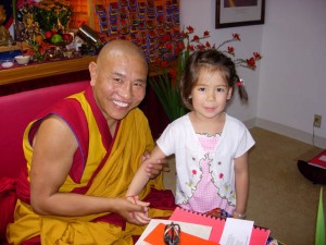 Jhado Rinpoche with a young student, 2008