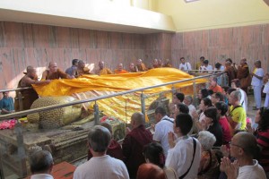 Pilgrims come to venerate the 15-foot statue of the reclining Buddha, and to drape it with beautiful shawls