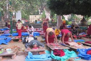 Early every morning mainly Tibetan practitioners do full prostrations, facing the stupa.