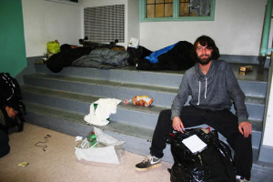 Travis Gowan, 26, used to sleep at the ROOTS shelter, but he recently “aged out” and now sleeps on the streets. Here he awaits a recent Friday Feast