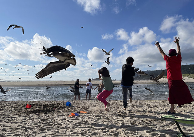 Sangha members, including the lama, celebrating the beauty of nature