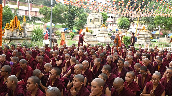 Nuns watch the inter-nunnery debate at the Mahabodhi temple in August, part of their preparation for the geshema exams.