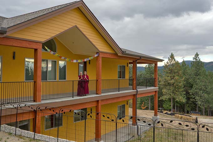 Nuns on the west side of the Buddha Hall deck face the Teacher’s Wing.