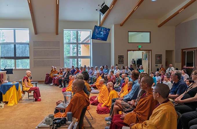 Abbess Venerable Thubten Chodron welcomes guests for the September consecration.