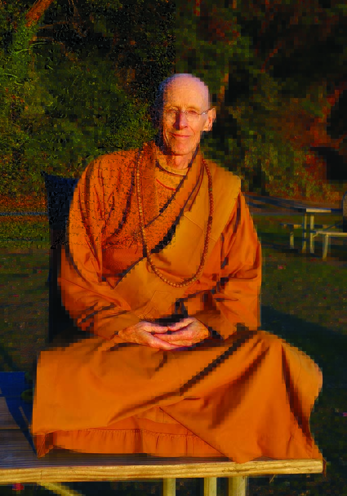 On a sunny October in 2025, Dharmamitra takes in the sunset at West Seattle’s Lincoln Park.