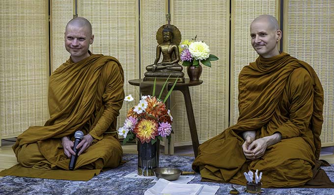 Ajahn Nisabho and Ajahn Kovilo listen to a community member’s question at a Clear Mountain Saturday gathering in September, 2025.