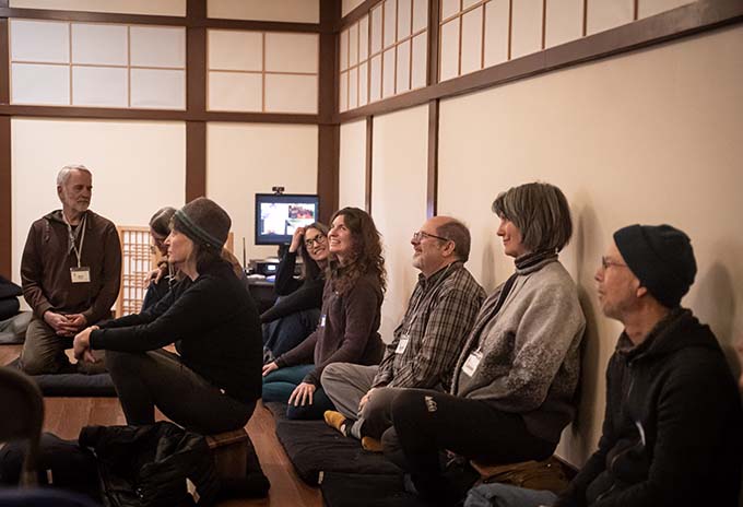 A sangha member shares an experience during a group reflection period at the end of our weekly meeting.