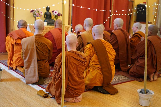 The monastics pay homage to Shakyamuni Buddha, founder of the Buddhist monastic community, at the start of the ceremony.
