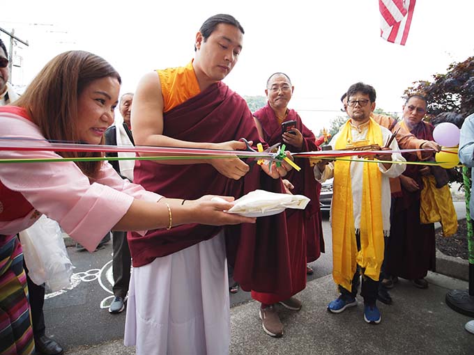 Avikrita Vajra Sakya Rinpoche doing the ribbon cutting at the opening of the Tibetan Community Center, in August 2025.