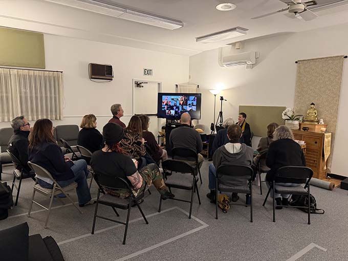 The sangha gathers for Tuesday night class.