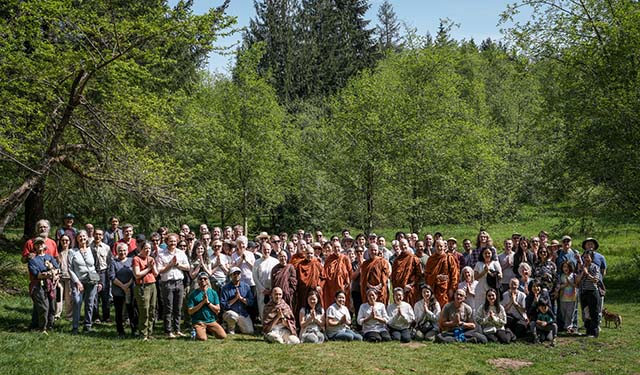 Bhikkhunis, bhikkhus and a large group of female and male supporters – traditionally called “the fourfold assembly - gather at the land in May 2026