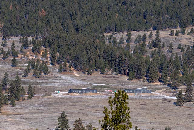 The three-year retreat buildings from a distance