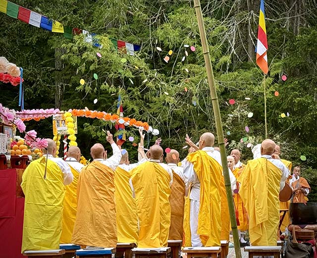 The monks scattering flower petals, based on the teachings of the Lotus Sutra