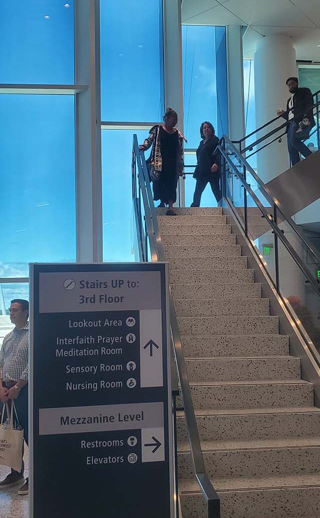 These stairs, or an elevator, take people up to the prayer and meditation room, and also a spacious overlook of the runways