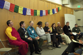 In the afternoon, a panel shared views on Buddhism and social action. From the left: Ven Tulku Yeshe Gyatso, Sith Chaisurote, Rick Harlan, Elaine Waller-Rose, Denis Martynowych, Rachel Moria Beals, Kurt Hoelting, Jason Worth, and Terran Campbell.