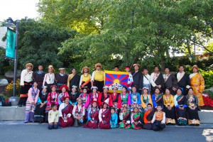 Tibetan community members in their national costumes, just before Seattle’s summer Seafair Torchlight Parade.