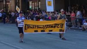 Gay Buddhists proudly carried the Dharma Buddies banner during Seattle Gay Pride parade