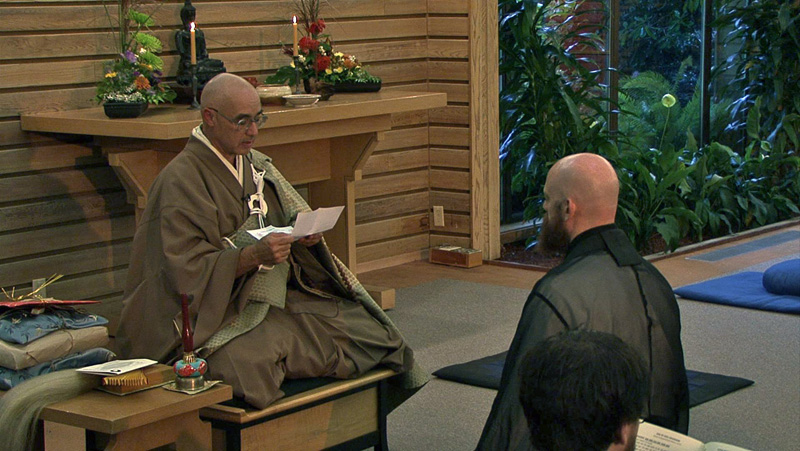 Genjo Marinello Osho faces Eshu Martin during the Osho ceremony