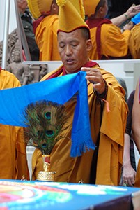 Geshe Konchog Tenzin, here offering a khata (scarf) to the sand mandala at the Seattle Asian Art Museum in 2011, will take over teaching once Losang Tsering’s illness makes it impossible for him to continue