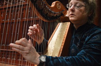 Kim Swennes, musical thanatologist, playing the harp