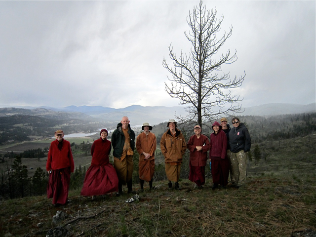 Monks, nuns, and dharma friends on a windy hill near the Old Gold Mine Hermitage