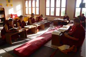 A group of nuns study together to prepare for the exams