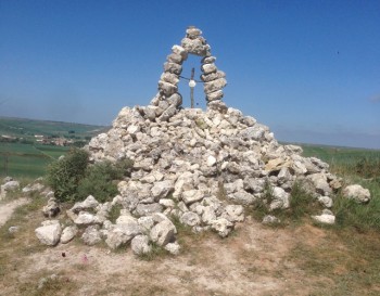 So many pilgrims have walked the Camino de Santiago that they’ve left this rock cairn.