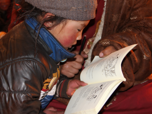 A student learning to read.