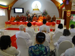 Buddhist clergy and laypeople from around the Seattle area gathered for meditation and chanting inside the chapel at the Seattle Meditation Center to celebrate International Vesak Day.