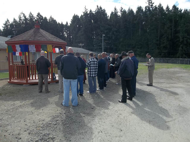 Residents of McNeil Island, and friends and supporters, at the dedication ceremony
