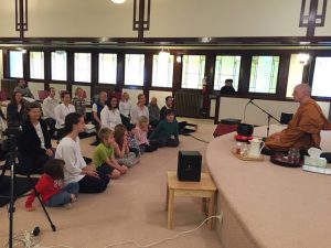 Ajahn Sona, a Theravada Thai forest monastic, leads a mediation talk for the kids of Portland Friends of the Dhamma’s family program