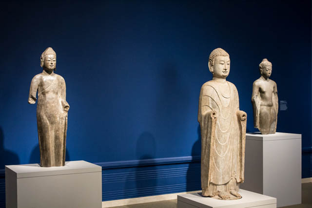 Three standing Buddhas, made of limestone and marble, from China and Thailand, are as old as the sixth century.