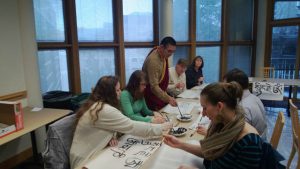 Ven. Tulku Yeshe Gyatso leads a calligraphy workshop at the Arts as Buddhist Practice festival, organized by Northwest Dharma Association in March, 2014.