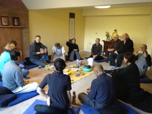 Ocean Light Zen Sangha sharing a meal after ceremony, in an earlier facility, in late 2011.