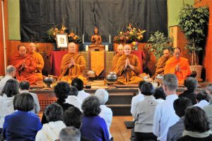 Honored guests join Pacific Hermitage monks chanting in Pali at the Pah Bah. The event, in White Salmon, helps to support the monastery.
