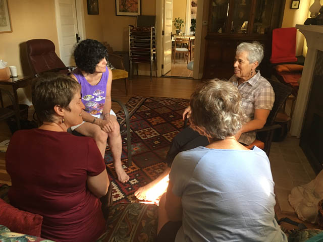 A small group explores their experience, led by Nelly Kaufer upper right. Others Jeanne Lamont, Pam Crow and Mary Forst.