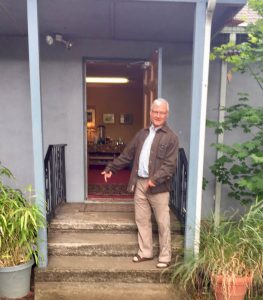 Portland Insight founder Robert Beatty shows the steps, now an obstacle to wheelchairs, which will be replaced with ramps.