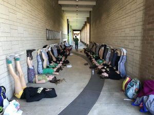 The Roosevelt High Schools girls’ swim team using mindfulness before the metro championship!
