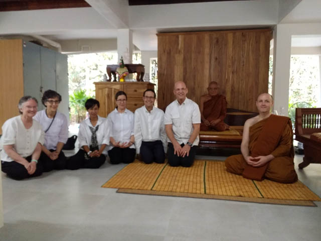 At Wat Na Pa Pong. Left to right: Ruby Grad, Carole Melkonian, Krissy Martin, Joan Benge, Matthew Grad, Scott Benge, Ajahn Liem, Ajahn Sudanto.