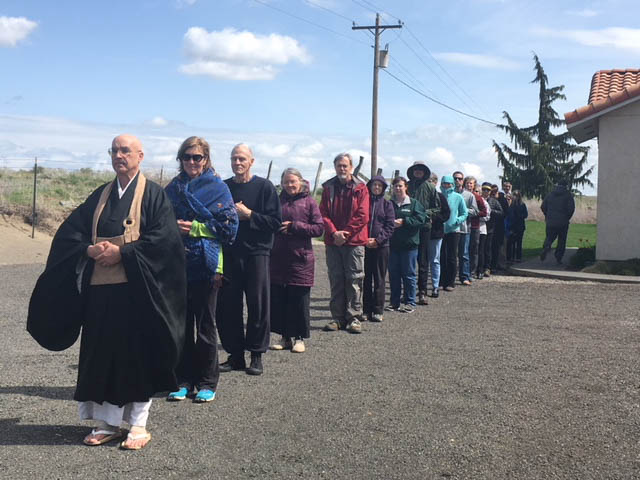 Genjo Marinello Osho, visiting from Seattle, leading kinhin (walking meditation) at a recent retreat with Wallw Walla Dharma sangha members and other retreatants