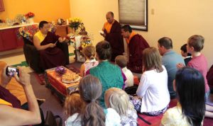 HH Dudjom Rinpoche granting Buddhist refuge and giving dharma names to children and families of Saraha Children’s School