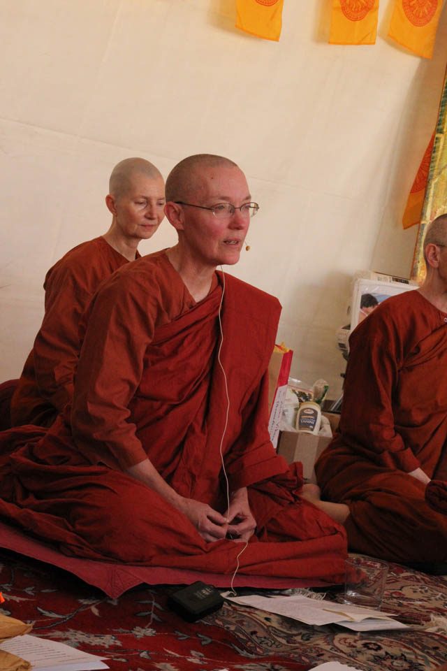 Santussikā Bhikkhuni speaks following the offerings, with Dhammadipa Samaneri behind her
