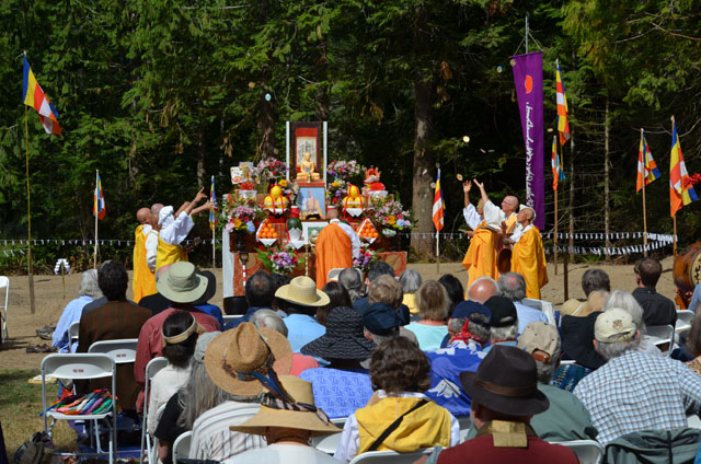 Nipponzan Myohoji monks and nuns make an offering