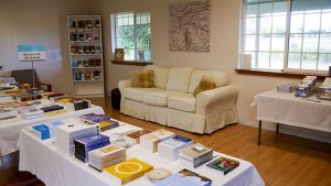 Visitors are welcome to relax and read at Paryiatti Books with cozy couches, tea, and plenty of Dhamma books